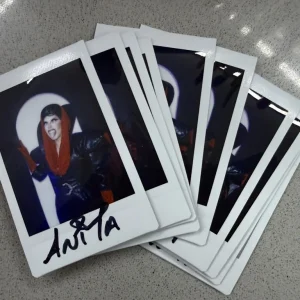 The full set of ten Anita Piss signed polaroids from the Entrance look photo shoot, each hand-signed in black ink
