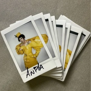 The full set of ten Anita Piss signed polaroids from the Meet the Queens shoot, each hand-signed in black ink