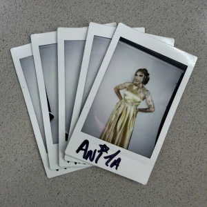 The full set of five Anita Piss design challenge signed polaroids from Anita's own shoot, each hand-signed in black ink